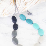 BB6103BLU LONG TONAL RESIN PEBBLE NECKLACE