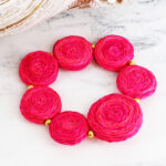 DC1509PK ELASTICATED RAFFIA DISC BRACELET