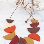 FB1403OR WOODEN HALF MOON FAN NECKLACE