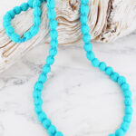 NB1501TU LONG SINGLE STRAND FABRIC BALL NECKLACE