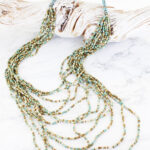 PP1307TU LONG MULTI-STRAND MIXED BEAD NECKLACE