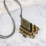 PP6205BL BEADED AZTEC PENDANT NECKLACE