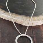 SP015R BEATEN RING NECKLACE WITH THREADED SILVER CHAIN [SILVER-PLATE]