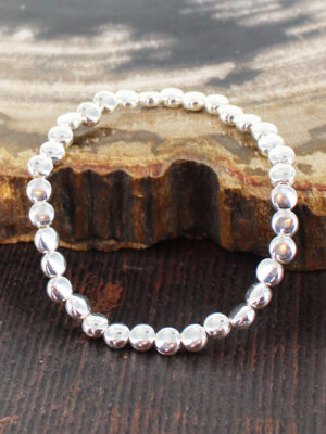 SP105D ELASTICATED DISC BRACELET [SILVER PLATE]