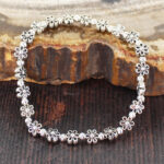 SP105F ELASTICATED FLOWER BRACELET [SILVER PLATE]
