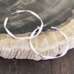 SP339R OPEN TWISTED RING EARRING [SILVER PLATE]