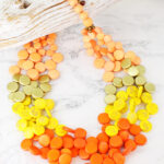 UJ1506OR WOODEN DISC CLUSTER NECKLACE
